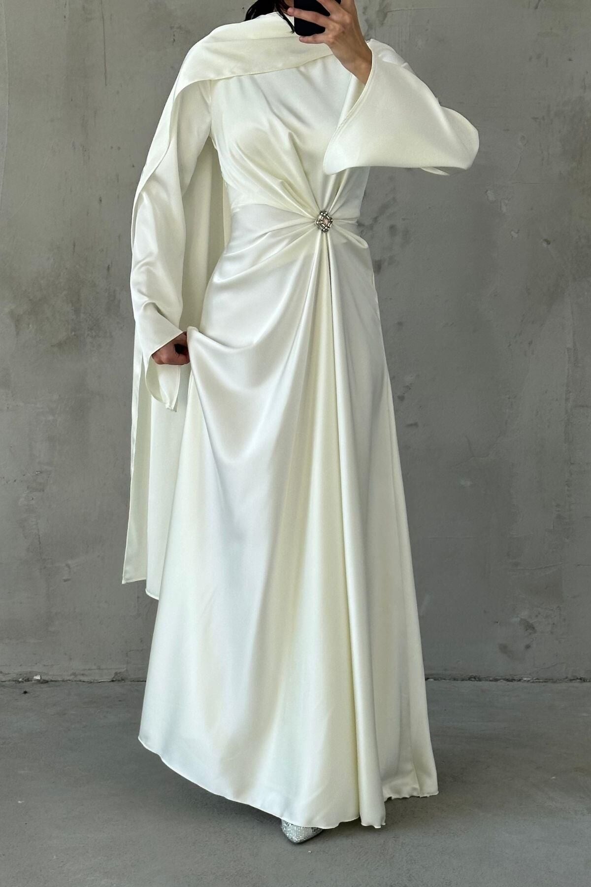 White Satin Hijab Evening Dress with Flowing Fabric and Brooch Detail