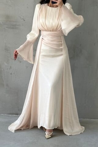 فستان سهرة حجاب جانجان بتفاصيل دراب وركيب لون بيج